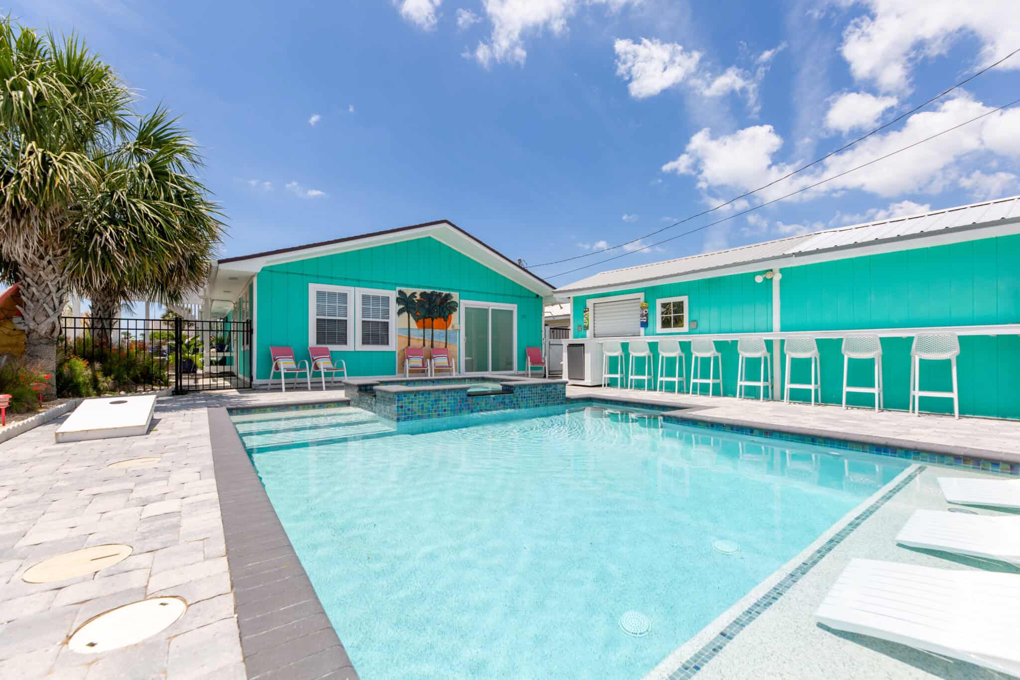 Image of the exterior of a house with a pool, ready for market