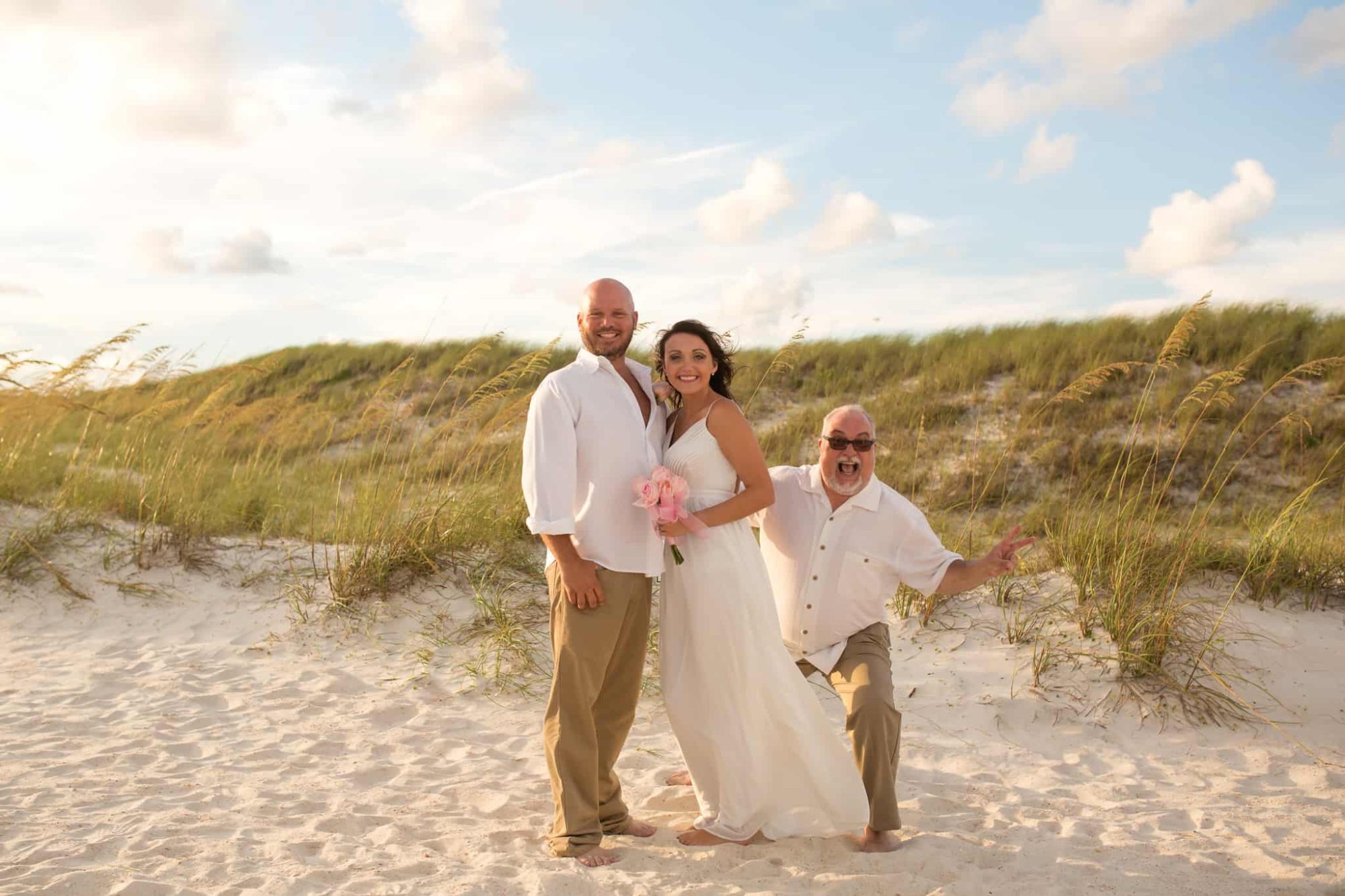 Officiant Doug with a couple he has just married