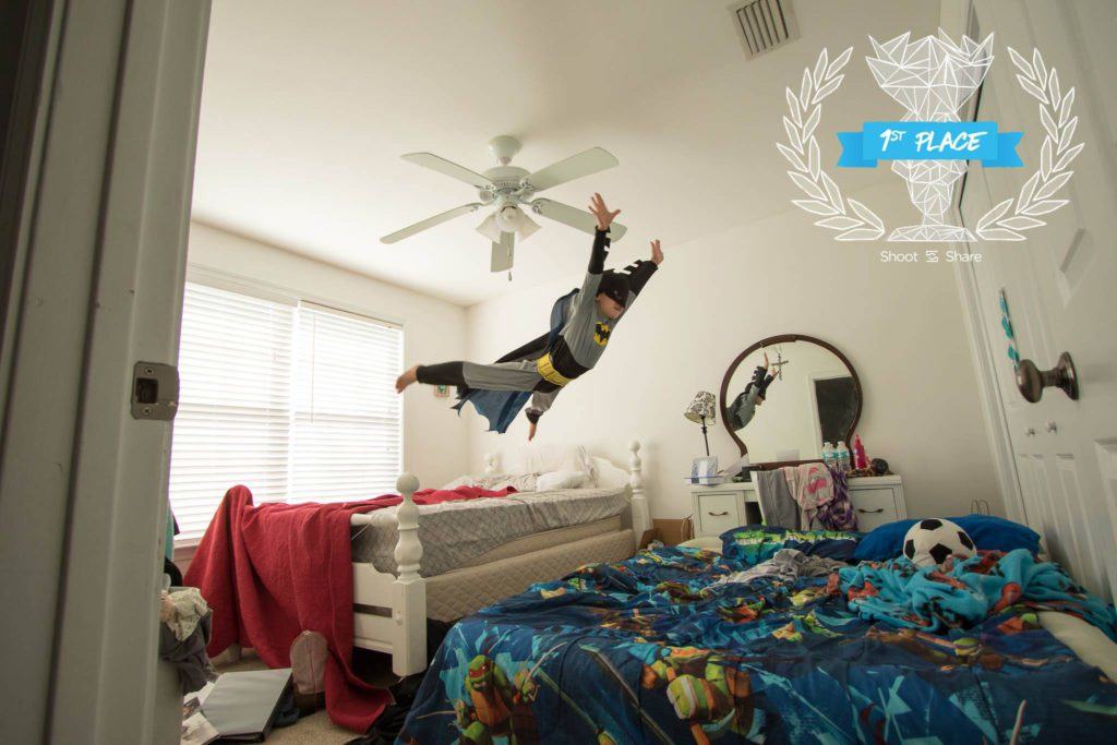 Shoot and Share 1st Place winning image of son playing Batman