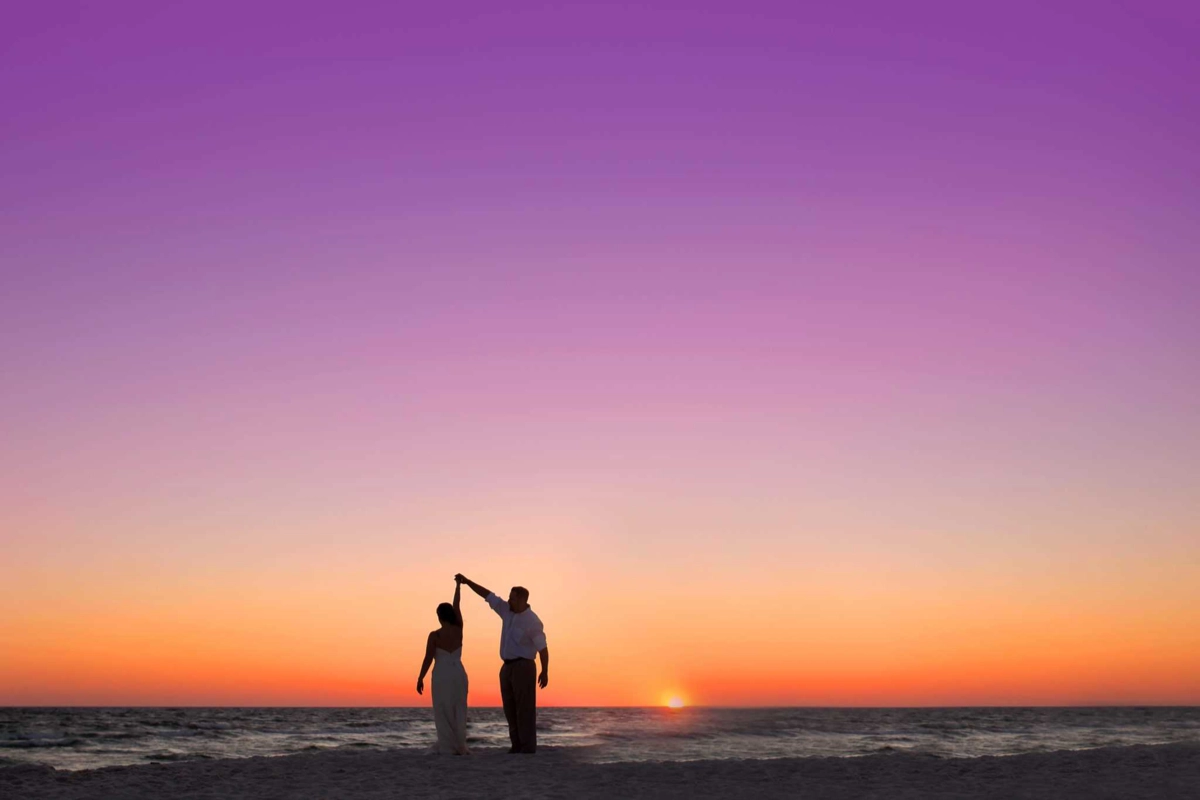 Couple dancing in the sunset