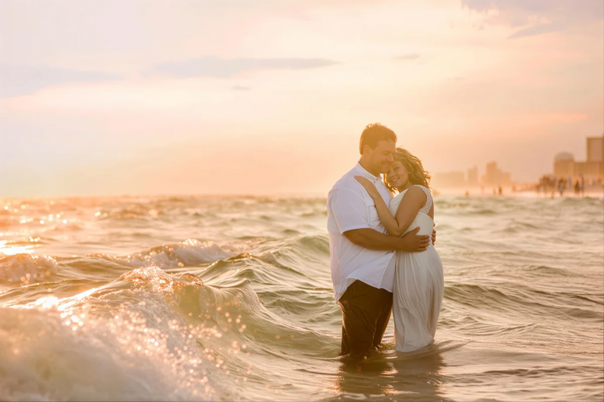 Couple  standing in the ocean